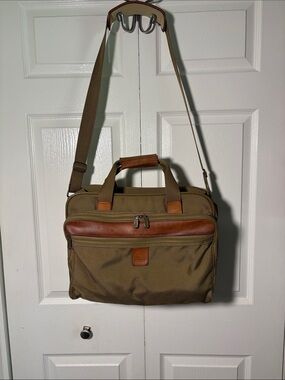 Hartmann nylon and leather  travel case with trolley sleeve.